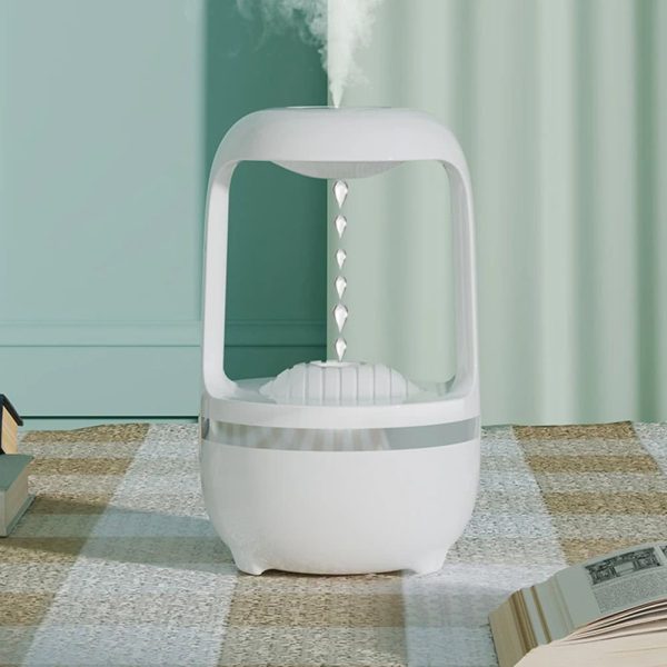 Moderner Luftbefeuchter mit Wassernebel, ideal für Raumluftverbesserung und angenehmes Raumklima. Perfekt für Zuhause oder Büro, mit stilvollem Design.