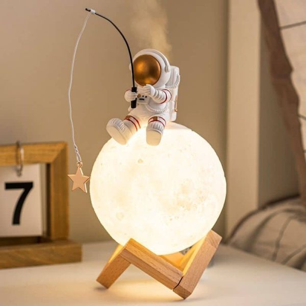 Dekorative Astronautenlampe mit Mondlicht und Stern.