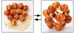 Holzmodell eines Moleküls mit Kugeln und Stäben, zeigt die Struktur eines chemischen Moleküls in einer wissenschaftlichen Dekoration.