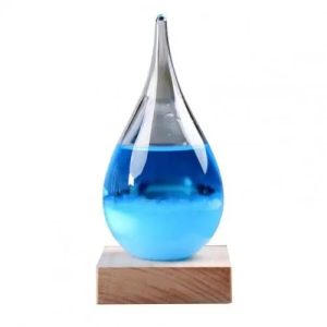 Wissenschaftliches Tropfenglas mit blauer Flüssigkeit auf Holzbasis, ideal für Dekoration und wissenschaftliche Experimente.