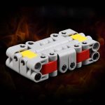 Modularer Feuerwehr-Notfall-Block aus bunten Bausteinen, ideal für Kinder und Lernspiele, mit rotem, gelbem und grauem Kunststoff.