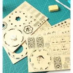 Detaillierte Laser-Cut-Modelle für wissenschaftliche Experimente.
