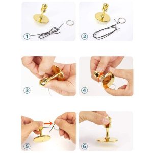 Hochwertiger wissenschaftlicher Schmuck, der ein kleines Experiment zeigt, inklusive einer goldfarbenen Halterung und einer Nadel, ideal für Dekoration und Sammler.