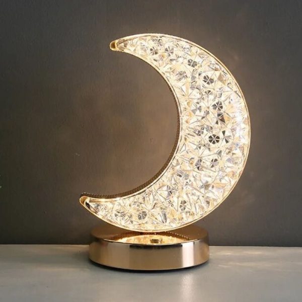 Elegante Monddeko aus Kristallen auf einem goldfarbenen Sockel, ideal für wissenschaftliche oder dekorative Zwecke.