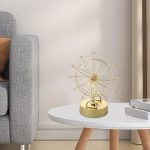 Elegantes Sternenrad aus goldfarbenem Metall, ideal als wissenschaftliches Dekorationsstück oder Geschenk für Wissenschafts- und Astronomie-Enthusiasten.