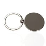 Schlüsselanhänger mit runder Magnetplatte, ideal für Schlüsselorganisation und Dekoration, aus Metall gefertigt.