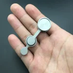 Miniatur-Wissenschaftsgerät für Experimente in der Hand, ideal für Bildung und Wissenschaftsdekoration.