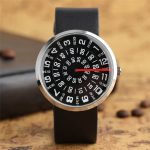 Moderne schwarze Armbanduhr mit innovativem Zifferblatt, das Stunden, Minuten und Sekunden in einem einzigartigen Design zeigt, ideal für Wissenschafts- und Technikliebhaber.