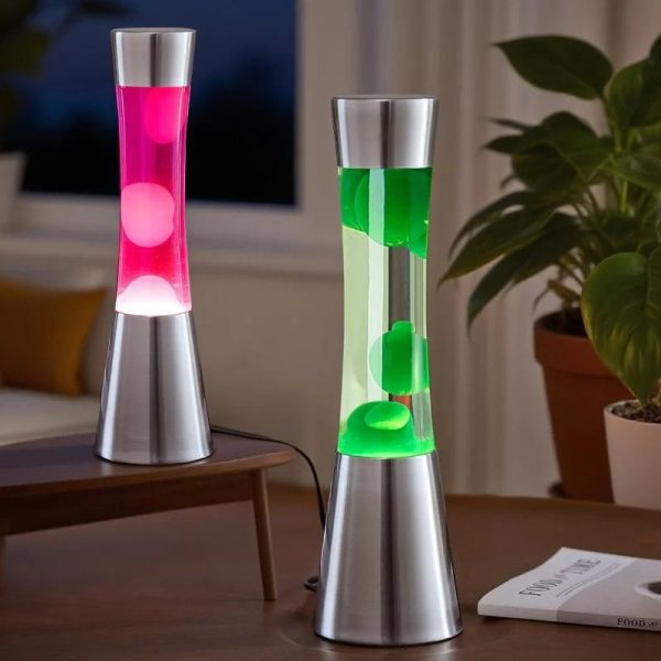 Moderne Lampe mit leuchtenden, schwebenden Luftballons in Pink und Grün, inspiriert von wissenschaftlichen Experimenten, auf einem Holztisch in einem gemütlichen Raum.