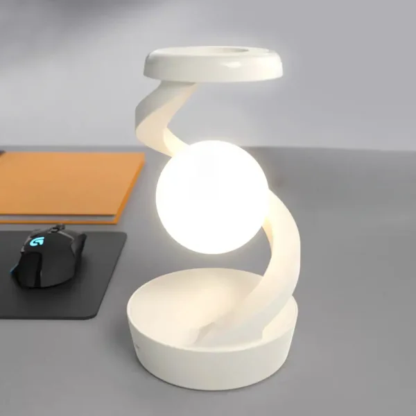 Moderne Tischlampe mit spiralförmigem Design und leuchtender Kugel, ideal als Dekoration oder Nachttischlampe.