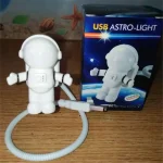 Niedliches USB-Astronauten-Nachtlicht in Form eines kleinen Raumfahrers, ideal für Kinderzimmer und als Geschenk für Weltraumfans.