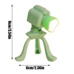 Kleines, leuchtendes Mikroskop-Modell als wissenschaftliche Dekoration, ideal für Science-Gadgets und Raumdekorationen, in grüner Farbe mit beleuchteter Linse.