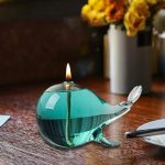 Dekorative Glas-Feuerschale mit brennender Flamme, ideal für stimmungsvolle Abende im Innen- und Außenbereich.