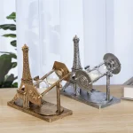 Dekorative Sanduhr mit Eiffelturm-Motiv in Gold und Silber, ideal für Wissenschafts- und Dekorationsliebhaber, stilvoller Blickfang für Zuhause oder Büro.