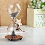 Dekorativer Sanduhr-Zeitmesser mit Sternanhänger, ideal für wissenschaftliche Dekorationen und Geschenke.