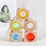Niedliches Holzspielzeug Kamera-Set mit bunten Elementen, ideal für Kinder zum Spielen und Lernen. Perfekt für kreative und pädagogische Aktivitäten.