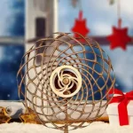 Dekorative Schneekugel mit spiralförmigem Design, ideal für wissenschaftliche Dekorationen und Geschenke, mit winterlichem Hintergrund.