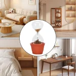 Sanduhr in Blumentopf – Zeit und Natur vereint.