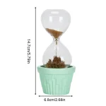 Kleine Sanduhr in einem grünen Blumentopf, ideal als wissenschaftliche Dekoration oder Geschenk, misst 14,7 cm in der Höhe.