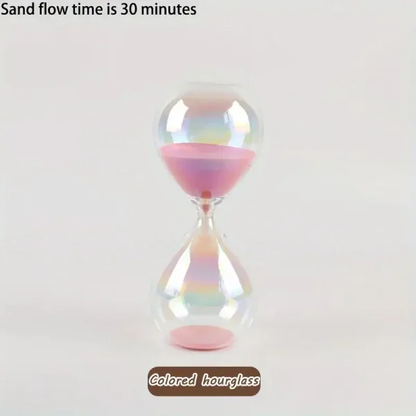 Bunte Sanduhr mit pinkem Sand, zeigt eine Laufzeit von 30 Minuten, ideal für Zeitmessung bei Spielen oder Kochen.
