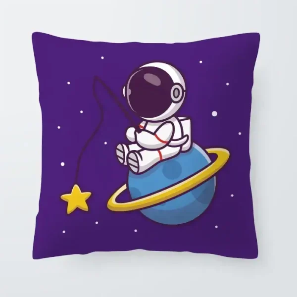 Kissen mit Weltraum-Design, Astronaut im All auf Planet mit Ring, Stern und Rakete.