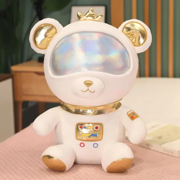 Niedliches Kuscheltier in Form eines Astronauten mit goldenen Details und reflektierendem Visier, ideal als Dekoration oder Sammlerstück.