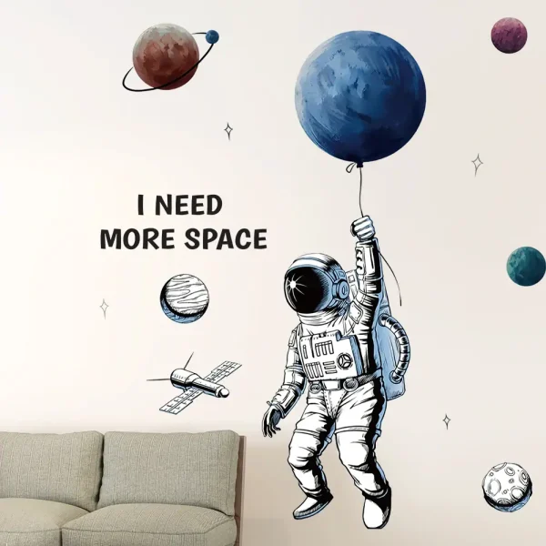 Wanddekoration mit Astronaut und Planeten, ideal für Weltraum- oder Science-Fiction-Themen. Perfekt für Kinderzimmer, Klassenzimmer oder Science-Liebhaber.