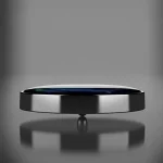 Modernes wissenschaftliches Objekt, schwebend über einer reflektierenden Oberfläche, symbolisiert Innovation und Physikforschung.
