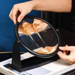 Wissenschaftliches Objekt mit Sand und Wasser, das in einem runden Rahmen präsentiert wird, ideal für Dekoration und wissenschaftliche Gadgets.