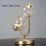 Elegante wissenschaftliche Dekoration mit Goldrahmen und Glaskugeln, ideal für moderne Büros oder Wohnräume, Maße 16cm x 15cm x 31cm.