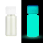 Kleines Fläschchen, das im Dunkeln leuchtet, mit weißem Körper und blauer Kappe, ideal für wissenschaftliche Dekorationen und Experimente.