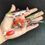 Detailliertes Modellset mit verschiedenen Fisch- und Meereslebewesen, ideal für wissenschaftliche Demonstrationen und Dekorationen.