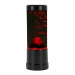 Tischlampe inspiriert von einem ausbrechenden Vulkan mit roten Lichteffekten, ideal für eine originelle und moderne Dekoration.