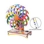 Buntes Schwungrad mit Farbkreisen, das Malfarben und Pinsel verteilt, ideal für wissenschaftliche und kreative Dekorationen.