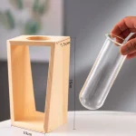 Holz-Experimentierständer mit Glasröhre, ideal für wissenschaftliche Experimente und Dekorationen, Maße: 18 cm hoch, 10 cm breit, 7,5 cm tief.