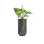 Moderner Wand-Blumentopf mit Wasseruhr-Design, ideal für Pflanzen und Dekoration, aus hochwertigem Material gefertigt.